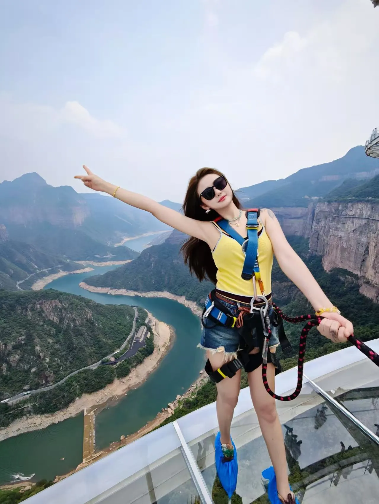 Skywalk river view pose · Moments from Recent Visitors